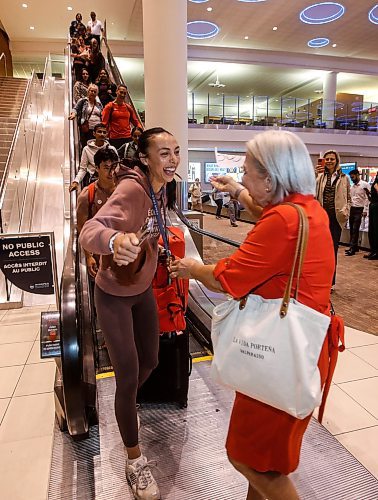 JOHN WOODS / FREE PRESS
Skylar Park, Olympic bronze medalist in taekwondo, greets her grandmother as she arrives at the Winnipeg airport as she returns from Paris Monday, August 12, 2024. 

Reporter: ken