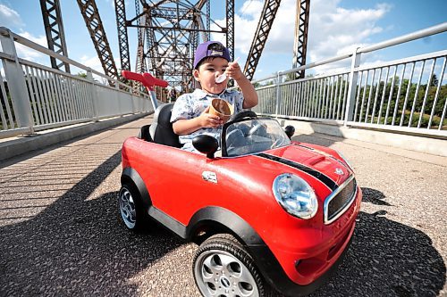 Ruth Bonneville / Free Press

Standup - Enjoying ice cream on a hot day in August in a little mini convertible Cooper (push) car.

Two-year-old Marcelo Gomez enjoys a cone in a dish of cool ice cream from Bridge Drive Inn with his parents and family on Monday. 

At one point he shared some with his dad, Robert,  but quickly went back to eating it himself while hanging out in his mini convertible Cooper push car. 


Aug 9th, 2024
