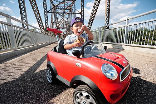 Ruth Bonneville / Free Press

Standup - Enjoying ice cream on a hot day in August in a little mini convertible Cooper (push) car.

Two-year-old Marcelo Gomez enjoys a cone in a dish of cool ice cream from Bridge Drive Inn with his parents and family on Monday. 

At one point he shared some with his dad, Robert,  but quickly went back to eating it himself while hanging out in his mini convertible Cooper push car. 


Aug 9th, 2024
