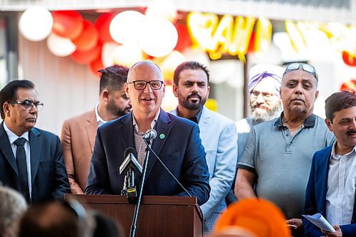 MIKAELA MACKENZIE / FREE PRESS

	
Mayor Scott Gillingham speaks at the ribbon-cutting for Duffy&#x573; Taxi&#x573; new building on Notre Dame on Monday, Aug. 12, 2024.

For Aaron Epp story.