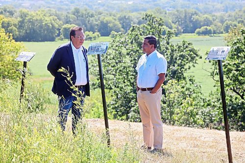 12082024
Sioux Valley Dakota Nation Chief Vince Tacan shows Crown-Indigenous Relations Minister Gary Anandasangaree around the site of the former Brandon Indian Residential School just west of Brandon along Grand Valley Road on Monday. Anandasangaree was visiting Sioux Valley Dakota Nation as a follow-up to federal government&#x2019;s recent apology to the 9 Dakota and Lakota First Nations in Canada and their members. (Tim Smith/The Brandon Sun)