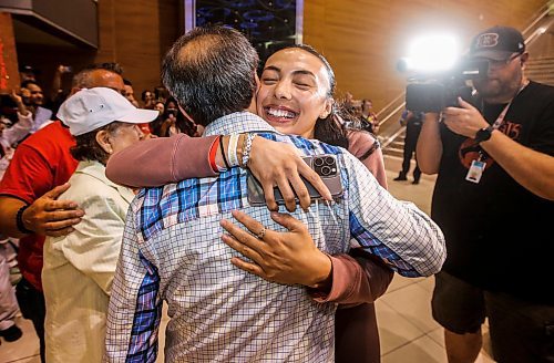 JOHN WOODS / FREE PRESS
Skylar Park, Olympic bronze medalist in taekwondo, hugs her grandfather Grandmaster Duek Hwa Park as she arrives at the Winnipeg airport as she returns from Paris Monday, August 12, 2024. 

Reporter: ken