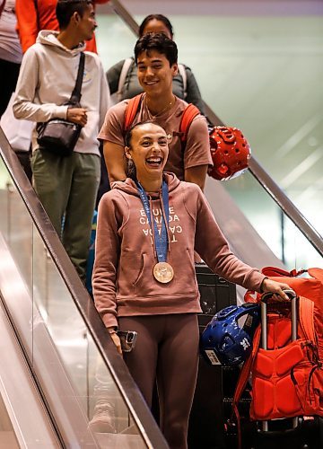 JOHN WOODS / FREE PRESS
Skylar Park, Olympic bronze medalist in taekwondo, arrives at the Winnipeg airport as she returns from Paris Monday, August 12, 2024. 

Reporter: ken