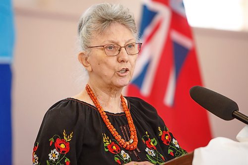 MIKE DEAL / WINNIPEG FREE PRESS
Joanne Lewandosky, president of the Ukrainian Canadian Congress speaks during Finance Minister Cameron Friesen's traditional Budget 2022 shoe announcement where he is handing her a box of essential personal hygiene items as a symbolic gesture, at 935 Main Street, Ukrainian National Federation of Canada, Monday morning.
220411 - Monday, April 11, 2022.