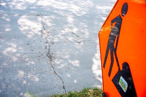 NIC ADAM / FREE PRESS
Potholes plague Greensboro Square in Waverley Heights pictured Tuesday afternoon. 
240813 - Tuesday, August 13, 2024.

Reporter: ?