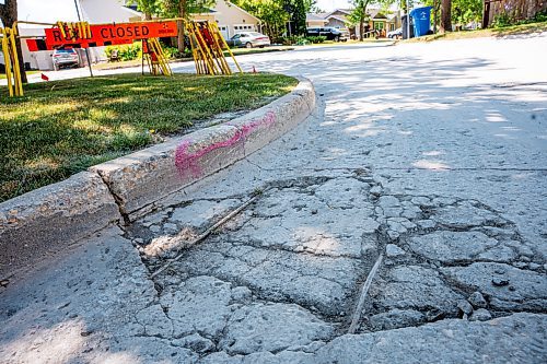 NIC ADAM / FREE PRESS
Potholes plague Greensboro Square in Waverley Heights pictured Tuesday afternoon. 
240813 - Tuesday, August 13, 2024.

Reporter: ?