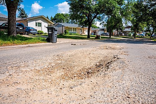 NIC ADAM / FREE PRESS
Potholes plague Augusta dr. in Waverley Heights pictured Tuesday afternoon. 
240813 - Tuesday, August 13, 2024.

Reporter: ?