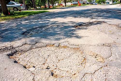 NIC ADAM / FREE PRESS
Potholes plague Augusta dr. in Waverley Heights pictured Tuesday afternoon. 
240813 - Tuesday, August 13, 2024.

Reporter: ?