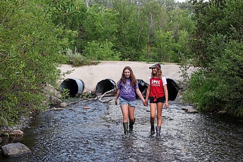 13082023
Best friends Georgia Richards and Myah LeBoutillier explore the shale creek at Big Valley northwest of Neepawa after a picnic with Richards brother and grandmother on Tuesday afternoon.
(Tim Smith/The Brandon Sun)