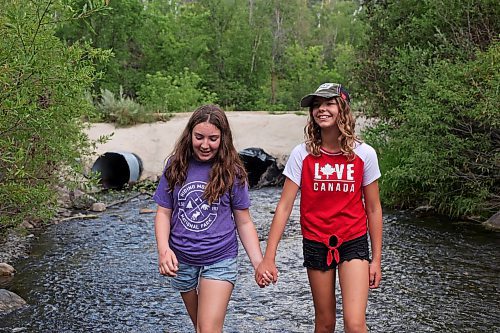 13082023
Best friends Georgia Richards and Myah LeBoutillier explore the shale creek at Big Valley northwest of Neepawa after a picnic with Richards brother and grandmother on Tuesday afternoon.
(Tim Smith/The Brandon Sun)