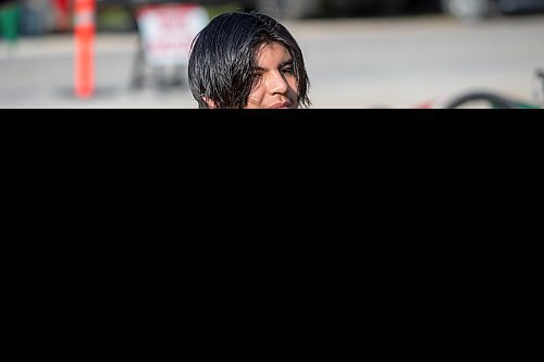 BROOK JONES / FREE PRESS
Brad Courchene, 17, who is from Sagkeeng First Nation, puts is pictured moments before the start of the Free Spirit Sprint Triathlon in Pinawa, Man., Sunday, Aug. 11, 2024.