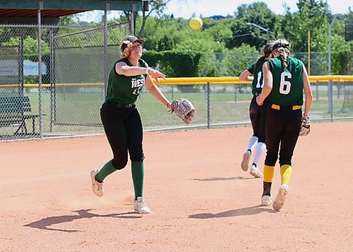 Olivia Wilson of Brandon hurries a throw to first base on a bunt drill during a recent Team West practice. (Perry Bergson/The Brandon Sun)