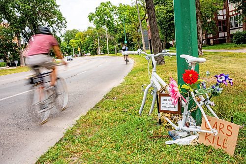 NIC ADAM / FREE PRESS
The ghost bike memorial to honour the life of Rob Jenner, the cyclist who died last month to a hit and run driver on Wellington Cres near Cockburn St, sits without its wheels, which were stolen last night, Wednesday.
240814 - Wednesday, August 14, 2024.

Reporter: ?