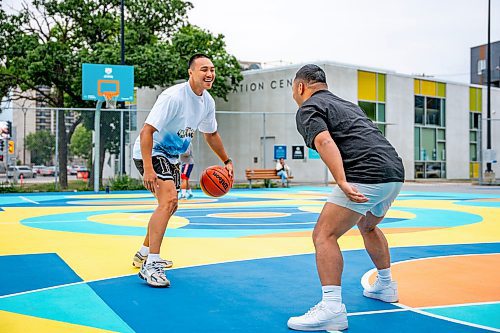 NIC ADAM / FREE PRESS
Joseph Medrano (left) and Calvin Diaz, shown at the Mayfair Recreation Centre&#x2019;s basketball courts Wednesday, are organizing Run it Back, a basketball tournament for high school alumni.
240814 - Wednesday, August 14, 2024.

Reporter: