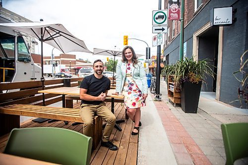 MIKAELA MACKENZIE / FREE PRESS

	
Councillor Sherri Rollins and Mike Del Buono, owner of Nola and Bar Accanto, at the restaurant&#x2019;s outdoor patio on Wednesday, Aug. 14, 2024. Rollins was the head of the property and development committee at City Hall that has eliminated the cost and drastically reduced the red tape required for restaurants and bars to build outdoor patios.

For Martin Cash story.