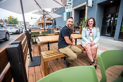 MIKAELA MACKENZIE / FREE PRESS

	
Councillor Sherri Rollins and Mike Del Buono, owner of Nola and Bar Accanto, at the restaurant&#x2019;s outdoor patio on Wednesday, Aug. 14, 2024. Rollins was the head of the property and development committee at City Hall that has eliminated the cost and drastically reduced the red tape required for restaurants and bars to build outdoor patios.

For Martin Cash story.