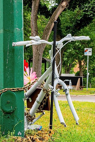 NIC ADAM / FREE PRESS
The ghost bike memorial to honour the life of Rob Jenner, the cyclist who died last month to a hit and run driver on Wellington Cres near Cockburn St, sits without its wheels, which were stolen last night, Wednesday.
240814 - Wednesday, August 14, 2024.

Reporter: ?