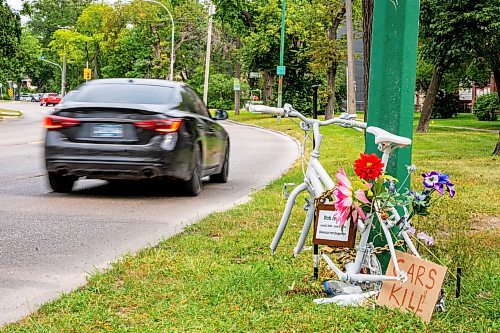 NIC ADAM / FREE PRESS
The ghost bike memorial to honour the life of Rob Jenner, the cyclist who died last month to a hit and run driver on Wellington Cres near Cockburn St, sits without its wheels, which were stolen last night, Wednesday.
240814 - Wednesday, August 14, 2024.

Reporter: ?