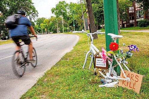 NIC ADAM / FREE PRESS
The ghost bike memorial to honour the life of Rob Jenner, the cyclist who died last month to a hit and run driver on Wellington Cres near Cockburn St, sits without its wheels, which were stolen last night, Wednesday.
240814 - Wednesday, August 14, 2024.

Reporter: ?