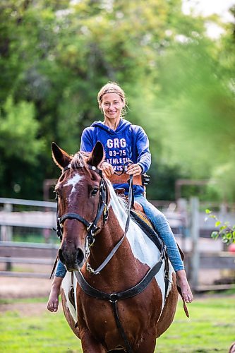 MIKAELA MACKENZIE / FREE PRESS

	
Alyssa Selman with her horse, Duke, on her property near Graysville on Tuesday, Aug. 13, 2024.

For Mike McIntyre story.