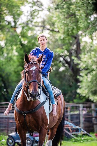 MIKAELA MACKENZIE / FREE PRESS

	
Alyssa Selman with her horse, Duke, on her property near Graysville on Tuesday, Aug. 13, 2024.

For Mike McIntyre story.