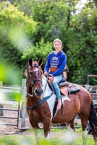 MIKAELA MACKENZIE / FREE PRESS

	
Alyssa Selman with her horse, Duke, on her property near Graysville on Tuesday, Aug. 13, 2024.

For Mike McIntyre story.