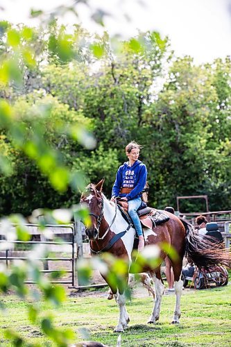 MIKAELA MACKENZIE / FREE PRESS

	
Alyssa Selman with her horse, Duke, on her property near Graysville on Tuesday, Aug. 13, 2024.

For Mike McIntyre story.