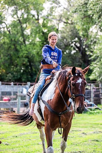 MIKAELA MACKENZIE / FREE PRESS

	
Alyssa Selman with her horse, Duke, on her property near Graysville on Tuesday, Aug. 13, 2024.

For Mike McIntyre story.