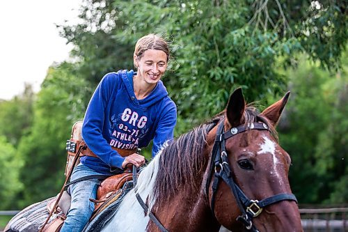 MIKAELA MACKENZIE / FREE PRESS

	
Alyssa Selman with her horse, Duke, on her property near Graysville on Tuesday, Aug. 13, 2024.

For Mike McIntyre story.