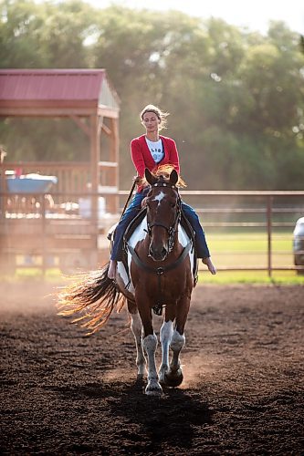 MIKAELA MACKENZIE / FREE PRESS

	
Alyssa Selman warms up her horse, Duke, at the Denim &amp; Dust Barrel Racing Series in Carman on Tuesday, Aug. 13, 2024.

For Mike McIntyre story.