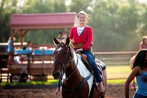 MIKAELA MACKENZIE / FREE PRESS

	
Alyssa Selman warms up her horse, Duke, at the Denim &amp; Dust Barrel Racing Series in Carman on Tuesday, Aug. 13, 2024.

For Mike McIntyre story.