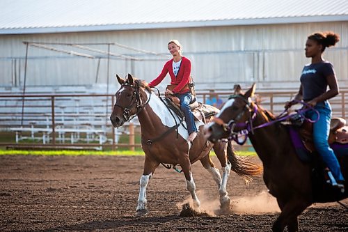 MIKAELA MACKENZIE / FREE PRESS

	
Alyssa Selman warms up her horse, Duke, at the Denim &amp; Dust Barrel Racing Series in Carman on Tuesday, Aug. 13, 2024.

For Mike McIntyre story.