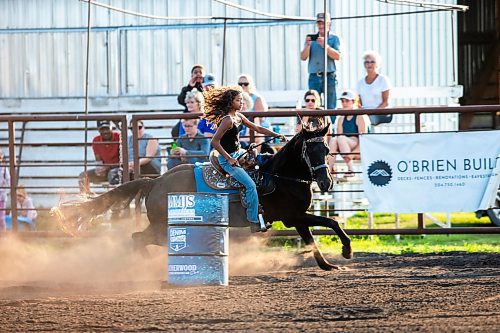 MIKAELA MACKENZIE / FREE PRESS

	
Ari Selman races on Kohl, placing in the top three in her division with a 20.9 second time, in the Denim &amp; Dust Barrel Racing Series in Carman on Tuesday, Aug. 13, 2024.

For Mike McIntyre story.