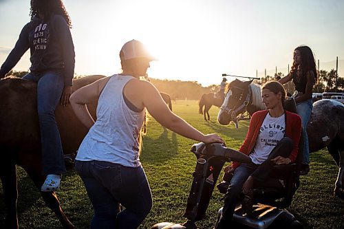 MIKAELA MACKENZIE / FREE PRESS

	
Sisters Amy Scott (left) and Alyssa Selman hang out at the Denim &amp; Dust Barrel Racing Series in Carman on Tuesday, Aug. 13, 2024.

For Mike McIntyre story.