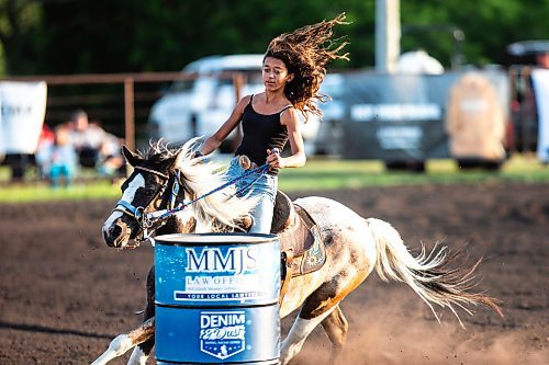 MIKAELA MACKENZIE / FREE PRESS

	
Ari Selman races on her pony, Arcadia, in the Denim &amp; Dust Barrel Racing Series in Carman on Tuesday, Aug. 13, 2024.

For Mike McIntyre story.