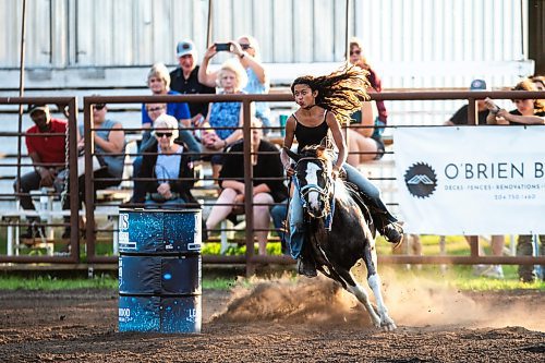 MIKAELA MACKENZIE / FREE PRESS

	
Ari Selman races on her pony, Arcadia, in the Denim &amp; Dust Barrel Racing Series in Carman on Tuesday, Aug. 13, 2024.

For Mike McIntyre story.