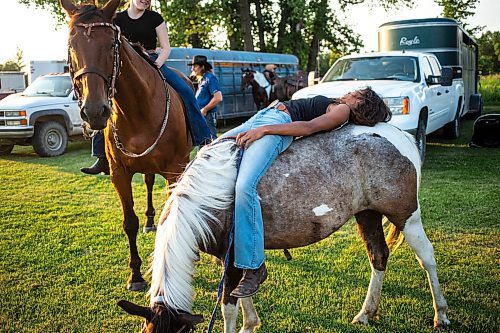 MIKAELA MACKENZIE / FREE PRESS

	
Ari Selman rides pony Arcadia bareback while hanging around at the Denim &amp; Dust Barrel Racing Series in Carman on Tuesday, Aug. 13, 2024.

For Mike McIntyre story.