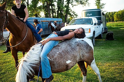 MIKAELA MACKENZIE / FREE PRESS

	
Ari Selman rides pony Arcadia bareback while hanging around at the Denim &amp; Dust Barrel Racing Series in Carman on Tuesday, Aug. 13, 2024.

For Mike McIntyre story.