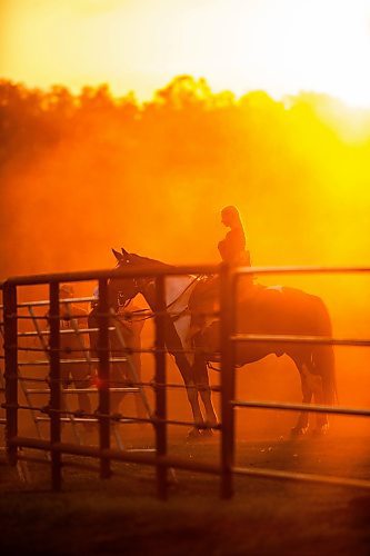 MIKAELA MACKENZIE / FREE PRESS

	
Alyssa Selman and her horse, Duke, wait their turn to race at the Denim &amp; Dust Barrel Racing Series in Carman on Tuesday, Aug. 13, 2024.

For Mike McIntyre story.