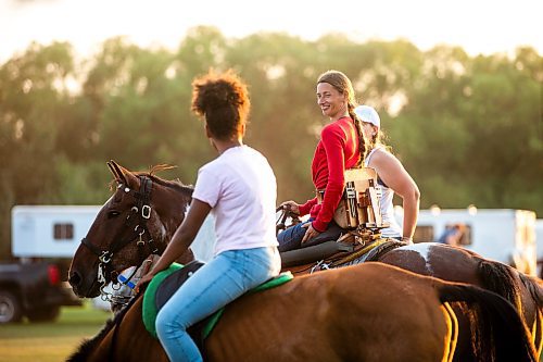 MIKAELA MACKENZIE / FREE PRESS

	
Alyssa Selman (centre) watches the open races before she competes at the Denim &amp; Dust Barrel Racing Series in Carman on Tuesday, Aug. 13, 2024.

For Mike McIntyre story.