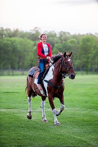 MIKAELA MACKENZIE / FREE PRESS

	
Alyssa Selman goes for a joy ride around the field after competing at the Denim &amp; Dust Barrel Racing Series in Carman on Tuesday, Aug. 13, 2024.

For Mike McIntyre story.