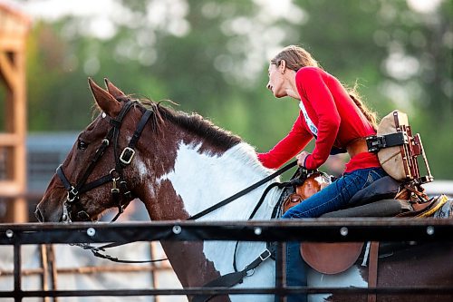 MIKAELA MACKENZIE / FREE PRESS

	
Alyssa Selman reaches down to pat her horse, Duke, right after crossing the finish line at the Denim &amp; Dust Barrel Racing Series in Carman on Tuesday, Aug. 13, 2024.

For Mike McIntyre story.