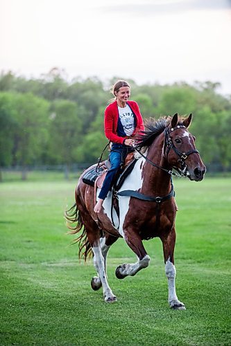 MIKAELA MACKENZIE / FREE PRESS

	
Alyssa Selman goes for a joy ride around the field after competing at the Denim &amp; Dust Barrel Racing Series in Carman on Tuesday, Aug. 13, 2024.

For Mike McIntyre story.