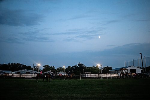 MIKAELA MACKENZIE / FREE PRESS

	
The moon rises over the Denim &amp; Dust Barrel Racing Series in Carman on Tuesday, Aug. 13, 2024.

For Mike McIntyre story.