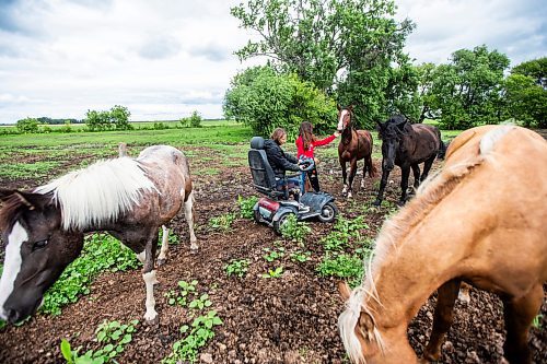 MIKAELA MACKENZIE / FREE PRESS

	
Alyssa Selman and her daughter, Ari Selman (13), with their horses at their property near Graysville on Thursday, Aug. 8, 2024.

For Mike McIntyre story.