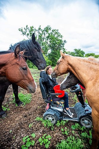 MIKAELA MACKENZIE / FREE PRESS

	
Alyssa Selman with her horses on her property near Graysville on Thursday, Aug. 8, 2024.

For Mike McIntyre story.