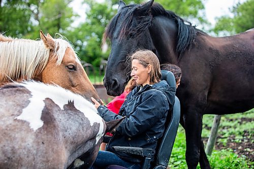 MIKAELA MACKENZIE / FREE PRESS

	
Alyssa Selman with her horses on her property near Graysville on Thursday, Aug. 8, 2024.

For Mike McIntyre story.