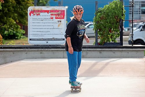 14082024
Twelve-year-old Airianna Nicholson of Brandon practices skateboarding during a week-long beginners skate camp put on by Recovery Skateshop at the Kristopher Campbell Memorial Skate Plaza in downtown Brandon on Wednesday morning. Recovery is running a similar camp for intermediate skateboarders next week. The recent Paris Olympics featured both men&#x2019;s and women&#x2019;s skateboarding events for the second time in Olympic history. (Tim Smith/The Brandon Sun)