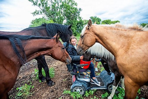 MIKAELA MACKENZIE / FREE PRESS

	
Alyssa Selman with her horses on her property near Graysville on Thursday, Aug. 8, 2024.

For Mike McIntyre story.