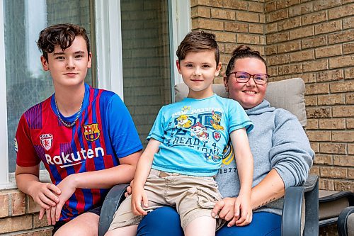 NIC ADAM / FREE PRESS
Melissa Walker (right), a mother of four from Birds Hill, is pictured alongside her sons Ethan, 8, and David, 14, Fillion outside their house Thursday.
240815 - Thursday, August 15, 2024.

Reporter: Maggie?
